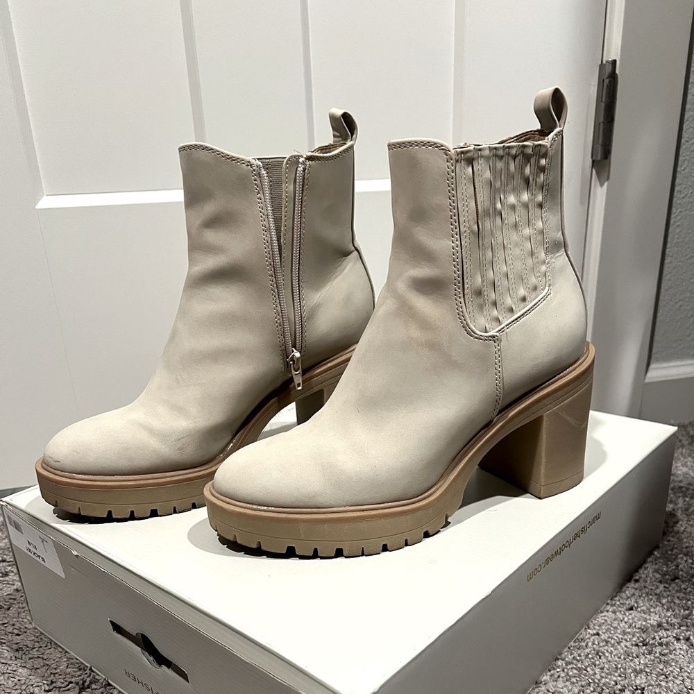 Light tan colored high heeled chunky bootie